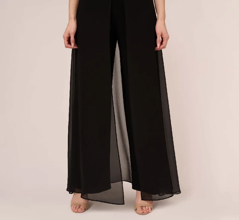 jersey-jumpsuit-with-chiffon-capelet-and-skirt-overlay-in-black-ap1d104868